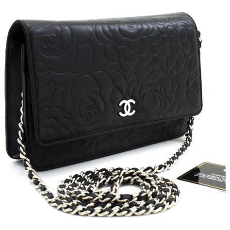 chanel black leather camellia wallet|Chanel wallet on chain preis.